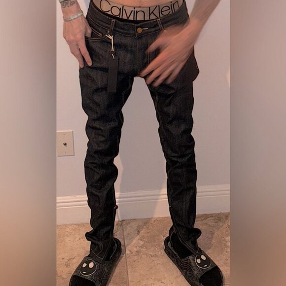 Stylish men's new, unworn (NWT) raw denim jeans from Fear of God, featuring a 30 - Picture 2 of 13